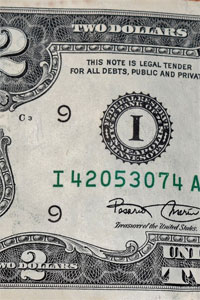 Detail of a $2 bill.